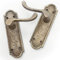 Pair of Antique Brass Finish Cast Iron Hammered Scroll Lever Door Handles on Back Plate