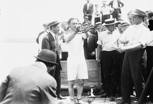 XcBAIHOUD Moderne Wandbild Harry Houdini wird mit Handschellen gefesselt bevor er in eine Kiste genagelt und in die Bucht von New York hinabgelassen wird für Wohnzimmerdekoration 60x90cm