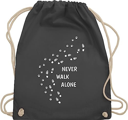 Turnbeutel Rucksack - Geschenk für Hundebesitzer - Never walk alone Pfotenabdrücke - Unisize - Dunkelgrau - gassi beutel tasche hund hundefan pfote stoffrucksack hundeliebhaber sachen hundefans