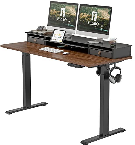 FEZIBO Electric Standing Desk with Glass Top Monitor Stand,140 * 67cm Adjustable Sit Stand Up Table with Double Drawer, Sit Stand Desk with Storage Shelf, Black Frame/Black Walnut Top