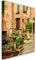 Feeby Vlies Leinwandbild Ziegelwand Enge Passage Altes Mietshaus Toskana Italien 60x90 cm Druckbild Wandbild Wanddekoration Deko Wand Aesthetic Grün Steinpflaster Pflanzen Beige