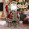 ECD Germany Statua di Babbo Natale, Figura Festiva, Decorazione Natalizia, Statuetta Decorativa Altezza 37 cm in Poliresina, Cappotto Rosso/Grigio, Pantaloni Verdi con Sacco, Ornamento Invernale