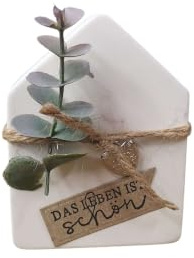 Handgemachtes Haus aus Beton, dekoriert mit Eukalypthus, Juteband und Metallherz - Dekohaus