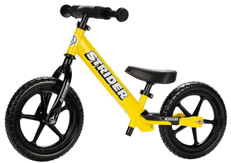 Strider 12” Sport Bike, Yellow - No Pedal Balance Bicycle for Kids 1 to 4 Years - Includes Safety Pad, Padded Seat, Mini Grips & Flat-Free Tires - Tool-Free Assembly & Adjustments