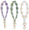 Puedno 3 Stück Boho Schlüsselanhänger, Gänseblümchen Makramee Keychain, Handgefertigtes Makramee Armband, Aesthetic Lanyard Schlüsselanhänger (Grün+Lila+Weiß)