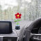 JOPOYOCO Handgefertigte gestrickte rote Blume Autozubehör, niedliche Wackelkopf rote Blume Armaturenbrett Dekorationen, häkeln Smiley rote Blume lustige Gadgets Auto Dekor für Frauen Mädchen Auto