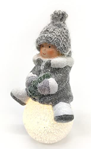 DARO DEKO Winterkind Mädchen auf LED Schneeball 19cm Dekofigur Weihnachtsdeko