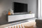 MINIO go for it - TV Schrank Donna, Breite 180 cm, TV Lowboard, Stehend oder Hängend, Fernsehschrank für das Wohnzimmer, Moderner Stil, Matera/Weiss Hochglanz - ohne LED Beleuchtung