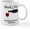 CafePress Book Club Reading Between The Mug 11 oz (325 ml) Ceramic Coffee Mug
