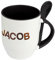 Namenstasse Jacob - Löffel-Tasse mit Namens-Motiv Schokoladenbuchstaben - Becher, Kaffeetasse, Kaffeebecher, Mug - Schwarz