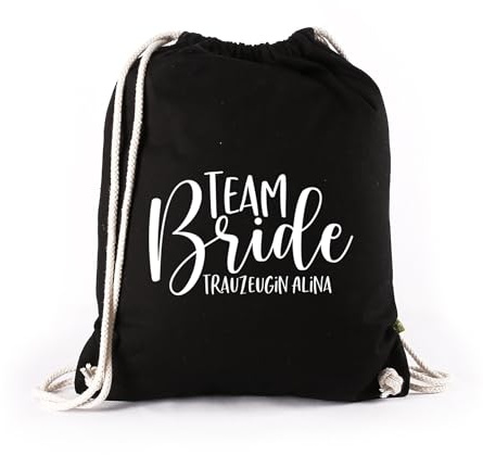 Herz & Heim® Personalisierter Turnbeutel Team Bride – JGA Rucksack mit Name – Hochzeitsbeutel für Junggesellenabschied – Baumwollbeutel mit Kordelzug (Schwarz)