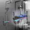 Juanya Columna de Ducha LED con Pantalla Digital y Hora, Sistema Ajustable en Altura con Ducha Higiénica, Grifería de 4 Modos, Pomo de Teclas Piano y Luz Multicolor