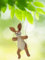 POMMERNTRAUM ® | Dekorationsfigur Sammlerfigur Dekoration Osterdekoration Osterhase Hase auf Schaukel (Emil)