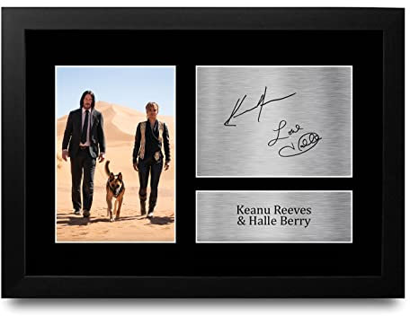 HWC Trading FR A4 Keanu Reeves & Halle Berry John Wick Geschenke Geducktes Signiertes Autogramm Foto für Fans von Film Memorabilien - A4 Gerahmt