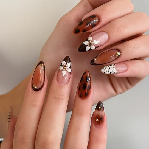 Long Almond Press On Nails, Brown French Tip False Nails, Mixed Designs | Nude And Amber Bases, Ivory Floral Motifs, Stripes, Tortoiseshell-Like Markings And Gold-Toned Accents, For Daily Wear