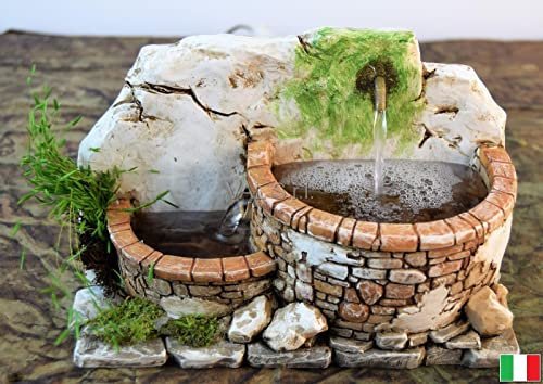 Fuente original con agua en movimiento.