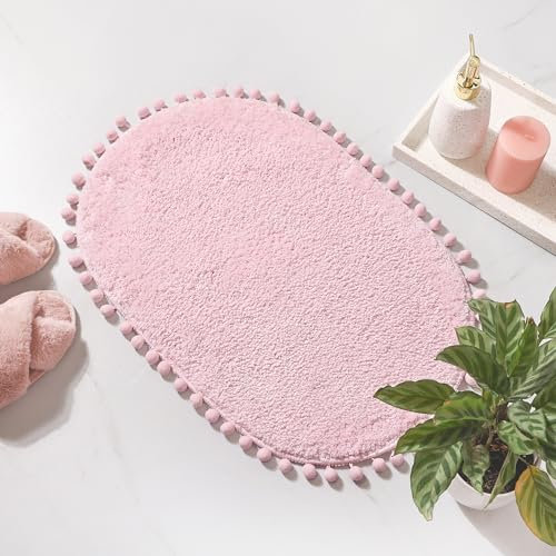 YIRDDEO Badematte, rosa Teppich mit Bommel, ovaler Badezimmerteppich für Schlafzimmer, rutschfest, niedlich, Boho, saugfähig, weicher Plüsch, waschbar, 50,8 x 76,2 cm