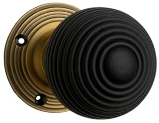 Designer Levers Queen Anne Reeded Door Knob, Antique Brass | Natural wood/antique brass; 53mm; includes two unsprung knobs, spindles, screws; dark wood.