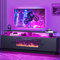 DWVO Moderno soporte de TV con chimenea, mueble de TV con chimenea eléctrica de 36 pulgadas, centro de entretenimiento con tiras de luz LED, consola multimedia para sala de estar, color negro