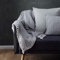 URBANARA Musselin-Decke Couco - 100% Baumwolle, Hellgrau/Grau, Gauze mit Stonewashed Effekt - 130x190 cm, Krabbeldecke Sofadecke Kuscheldecke - Oeko Tex 100 Zertifiziert