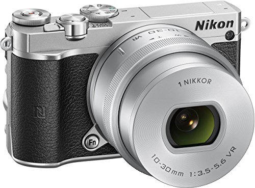 Nikon 1 J5 + 1 Nikkor 10-30 mm VR PD-ZOOM Fotocamera Digitale ad Ottiche Intercambiabili, 20,8 Megapixel, Video 4K, LCD Touchscreen Basculante 3, Argento [Versione EU]