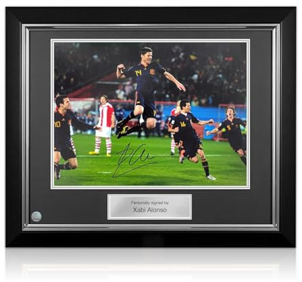 Exclusive Memorabilia Xabi Alonso Signed Spain Football Photo: 2010 World Cup Goal. Deluxe Frame