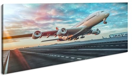 Leinwandbild Ein Flugzeug verschwindet im farbenprächtigen Sonnenuntergang Panorama Format: 120x60 cm XXL Kunstdruck Bild auf Keilrahmen/Wandbild/Wohnzimmer Deko