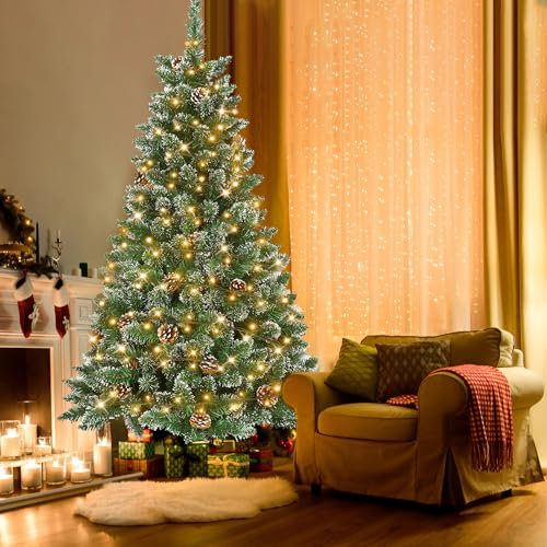 UISEBRT Albero di Natale artificiale con illuminazione a LED, 210 cm, con ghirlanda luminosa e supporto, decorazione natalizia in PVC verde con effetto neve e pigne