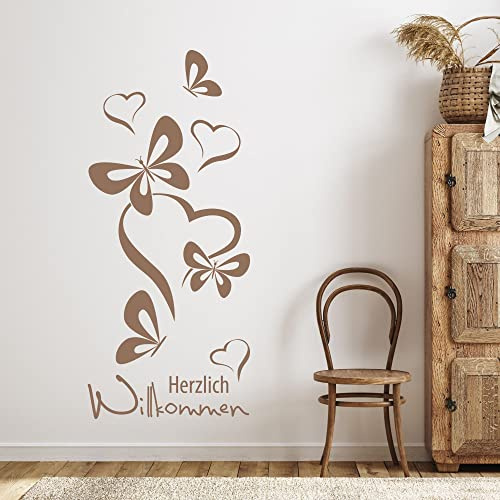 GRAZDesign Wandtattoo Flur Herzlich Willkommen Spruch, Schmetterlinge für Eingang, Wand Deko selbstklebende Klebefolie, Wohnzimmer, 130x57cm, 070 schwarz