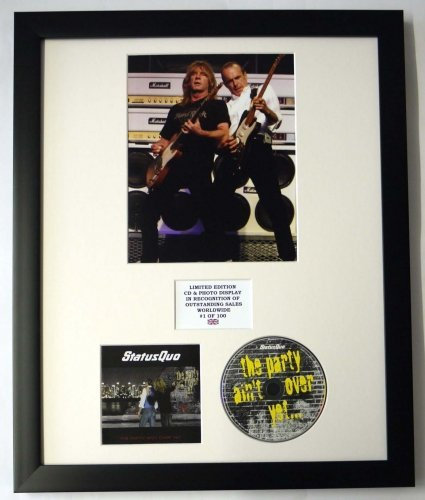 STATUS QUO/PHOTO & CD DISPLAY LTD. EDITION OF THE ALBUM THE PARTY AIN'T OVER YET...