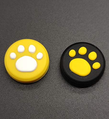 Lot de 2 capuchons de joystick analogiques en silicone pour manette Switch NS et Switch Lite avec patte de chat mignonne (combinaison jaune, 2 pièces)