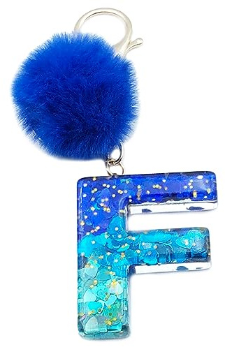 Xsclpomddy Frauen Alphabet Buchstaben Schlüsselanhänger Niedlich Schlüsselanhänger Glitzer mit Pom Pom Quasten Harz Blau Keychain für Tasche Charme