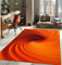 Tapis de Salon Moderne 120x180cm,Tapis Antidérapant,Tapis Salon Lavable,Grand Tapis Salle a Manger,Moquette Chambre/Descente de Lit,Tapis terrasse, Couloir,Spirale Orange
