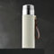 Longiang Gourde isotherme en acier inoxydable 500 ml avec gobelet et infuseur à thé, anti-fuite, isolation sous vide à double paroi, sans BPA, pour boissons chaudes et froides, blanc crème