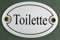 Buddel-Bini Emaille Türschild Toilette Weiss oval 7x10 cm Schild Emailleschild Metallschild Blechschild KloTürschild ToilettenTürschild WC