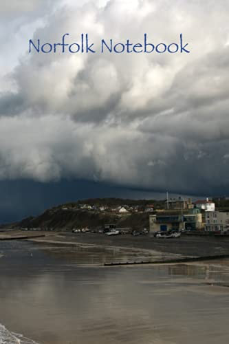 Norfolk Notebook - Stormy Cromer: A rainstorm over Cromer on the north Norfolk UK coast. Cover photography by MyriadLifePhotoArt