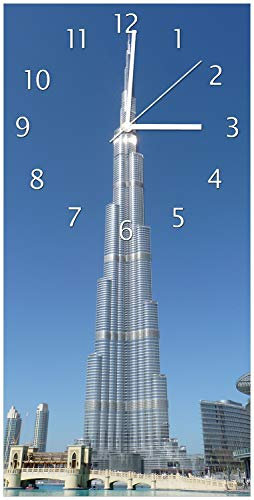 Wallario Design-Wanduhr Wolkenkratzer in Dubai aus Glas, Motiv-Uhr Größe 30 x 60 cm, weiße Zeiger