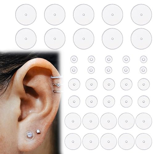 40x transparente Silikon-Ohrring-Rückseiten mit stabilisierenden Piercing-Scheiben und Kunststoff-Box. Inkl. 4 Größen für optimalen Halt der Ohrläppchen.