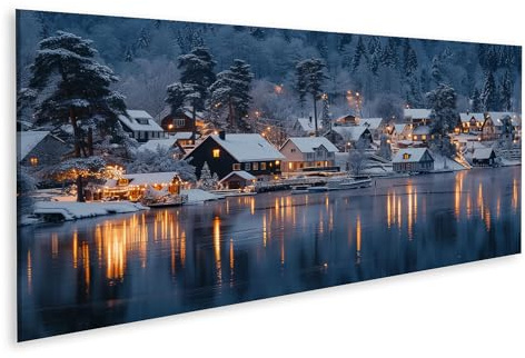 islandburner Leinwandbild Winterabend in einem verschneiten Dorf am See - Leinwand 120x40cm - Panorama