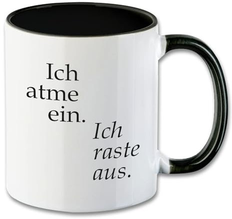 Tasse mit Spruch ″Ich atme ein, ich raste aus″ Keramik mit Griff und Innenseite in Schwarz Motiv T64 Geschenk Geburtstag Spruchtasse Motivtasse Büro Humor Kollegen 330 ml