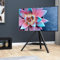 AVF Hoxton - Supporto per TV a treppiede, gambe in legno chiaro, ripiano in vetro nero, TV da 32 a 65