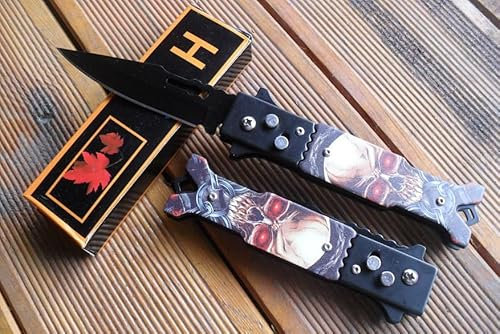 La Petite Caverne 117 - TÊTE DE MORT COUTEAU PLIANT DE POCHE LAME ACIER NOIR 8,5 CM MANCHE ACIER OUTDOOR