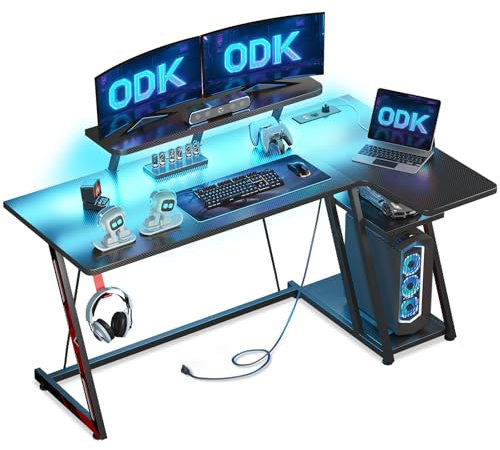 ODK Bureau Gaming avec Lumières LED et Prises électriques, Bureau Gamer avec Support de Moniteur et étagère de Rangement Fibre de Carbone Noir 140 cm