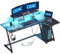 ODK Scrivania Gaming Angolare con Luci LED, Prese di Corrente e Supporto per Monitor, Tavolo Gaming con Ripiano di Stoccaggio Fibra di Carbonio Nera 140 cm