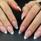 24Pcs Almond False Nails - Blue French Tip Nude Pink Press on Nails - Medium Length Glossy Fake Nails with Glue - Natural French Stick on nails - Elegant Blue Tips Acrylic nails for Women Girls
