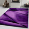 Carpetsale24 Kurzflor Teppich 140x200 cm, Modern Abstrakt Design in Lila Schwarz, Pflegeleicht, ideal für Wohnzimmer, Essbereich oder Jugendzimmer