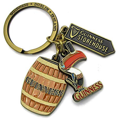 Guinness Offiziell Multi-Charm Schlüsselanhänger mit Tukan, Schild und Zylinder Amulette