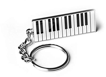 Porte-clés clavier de piano en métal argenté et résine robuste présenté dans une pochette cadeau de luxe