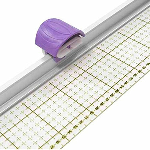 Règle avec cutter rotatif Cutter rotatif avec règle intégrée pour découper plusieurs tissus à la fois