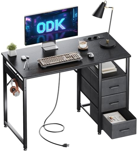ODK Kleiner Schreibtisch mit 3 Schubladen aus Stoff, Computertisch mit 2 Steckdosen und USB-Anschlüssen, Umkehrbarer PC-Schreibtisch Bürotisch für kleines Home Office(Schwarz, 100x48x75.5cm)